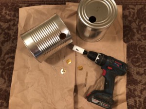 Air intake and exhaust holes drilled on DIY Tin Can Smoker